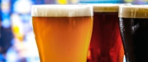 Three glasses of different color beere