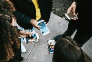 people in a circle on their phone