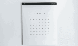 black and white image of January 1 calendar page on a white wall