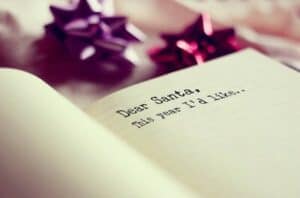 dear santa letter with bows in the background