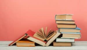 stack of books one open