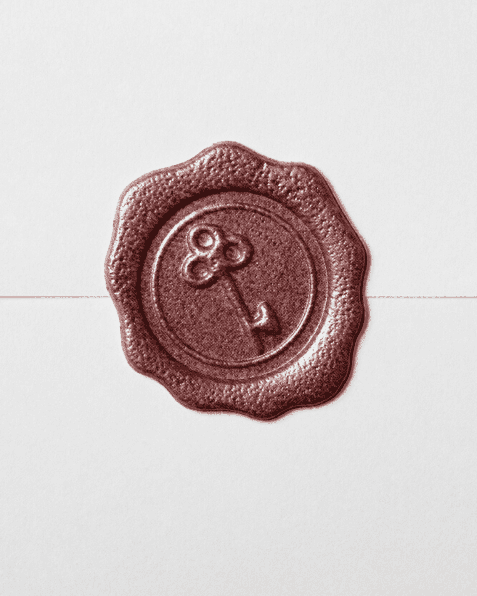 A red wax stamp with a key embossed sealing a white envelope.